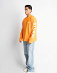STUDIO ORANGE OVERSIZED LONGSLEEVE
