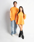 STUDIO ORANGE OVERSIZED LONGSLEEVE